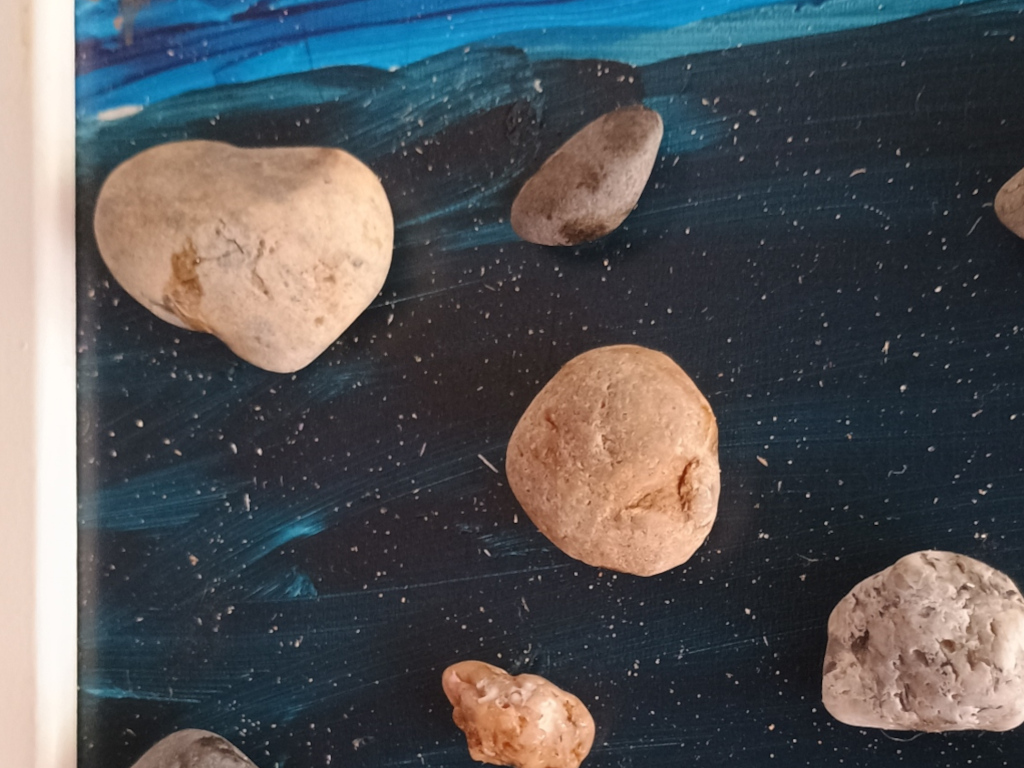 Handmade artwork featuring real sand, shells, and pebbles from Bolonia Beach by Sun Kissed Crafts.